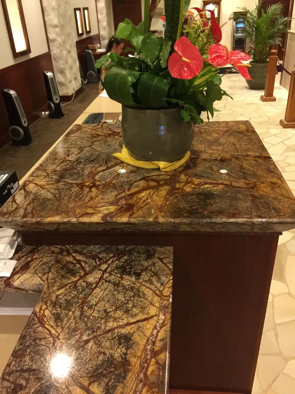 Tuff Skin going on to a marble concierge desk, Honolulu — Ace Glass Tinting