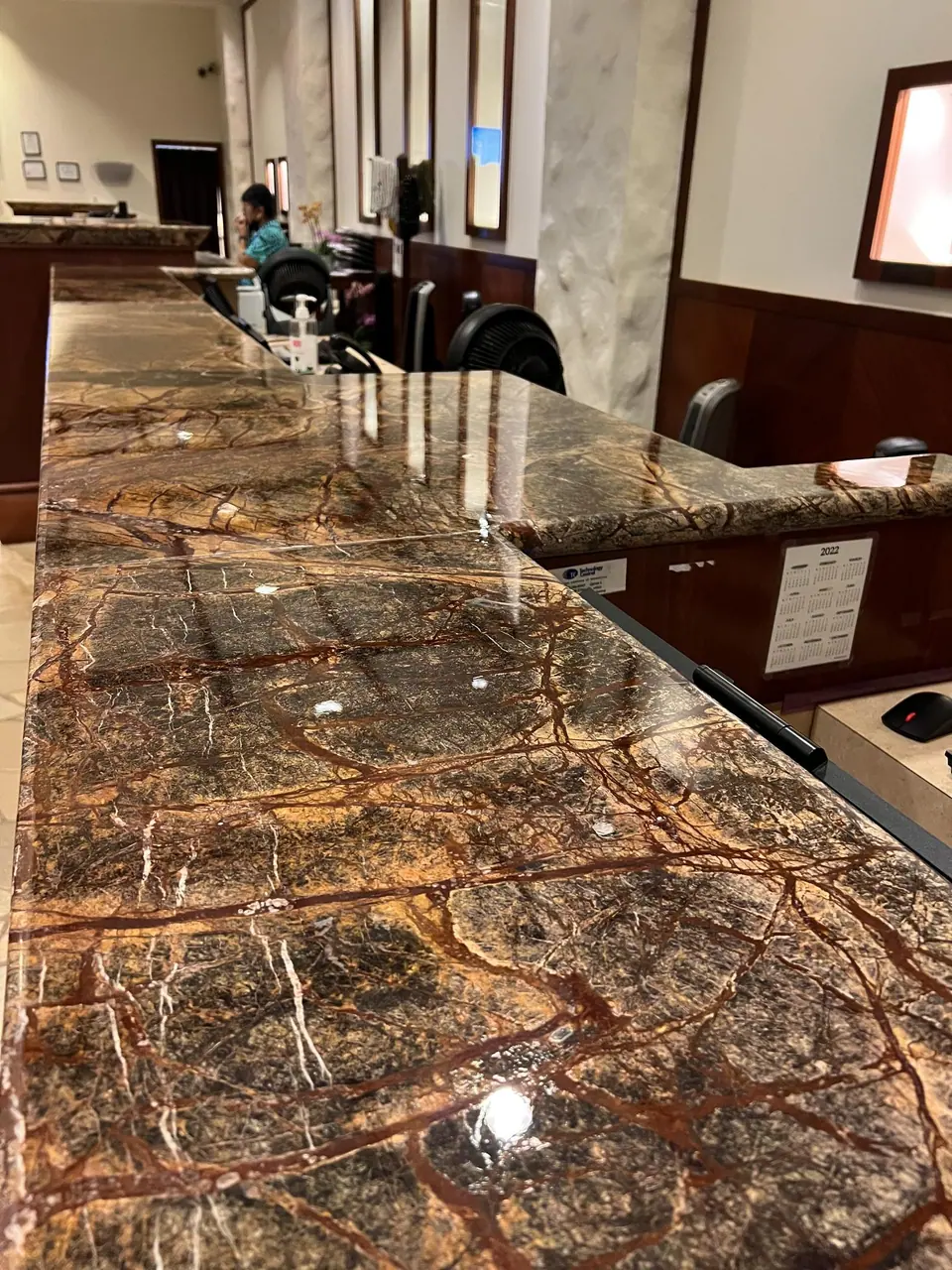 Tuff Skin on a marble reception counter, hotel lobby, Honolulu — Ace Glass Tinting
